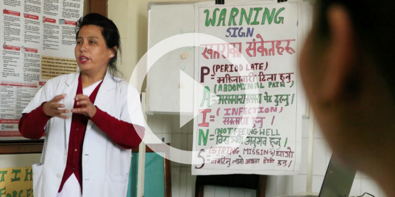 Photo of doctor training health workers in Nepalese clinic