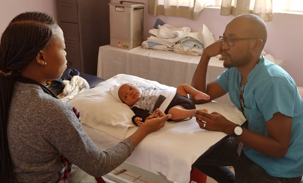 Baby J is treated by physiotherapist at clubfoot clinic, Lusaka, Zambia.